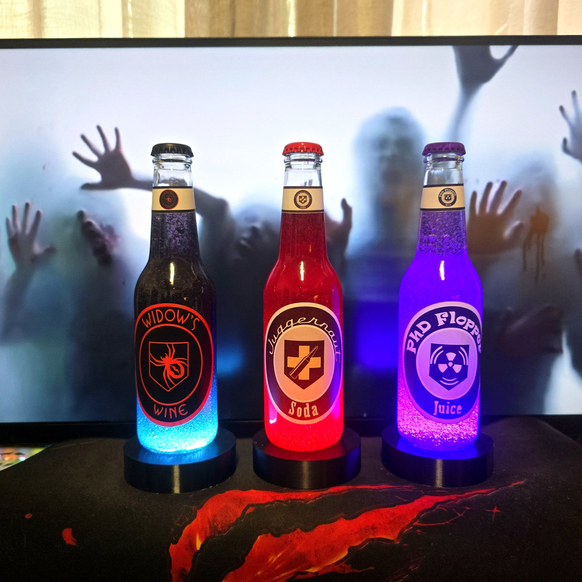 Hand-crafted Perk-a-Cola bottle Call of Duty Zombies filled with vibrant compound on LED stand